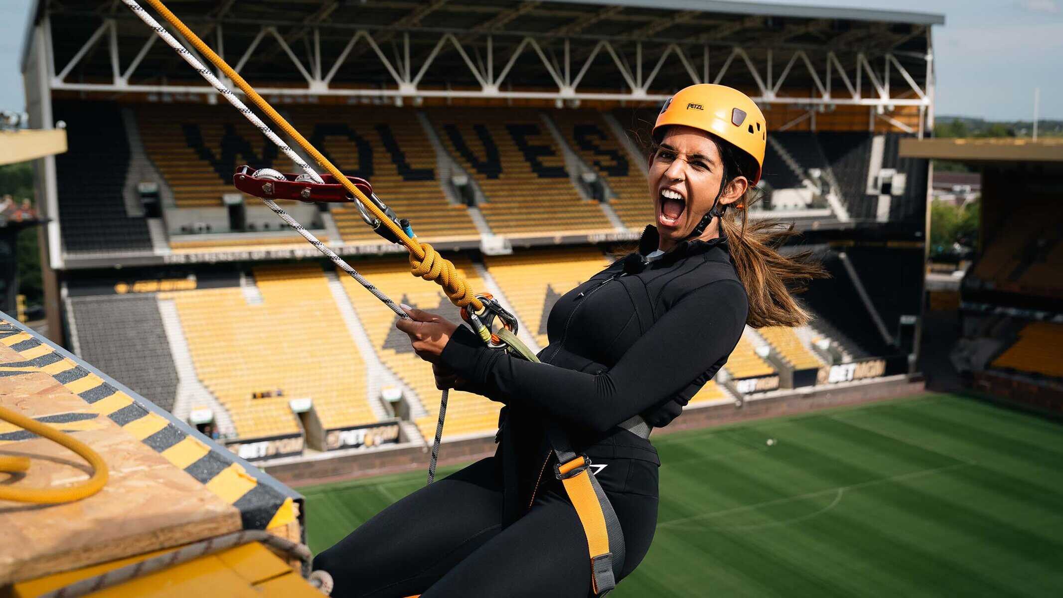 Fans hit the heights for Molineux Abseil Image